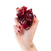 hand holding resin heart